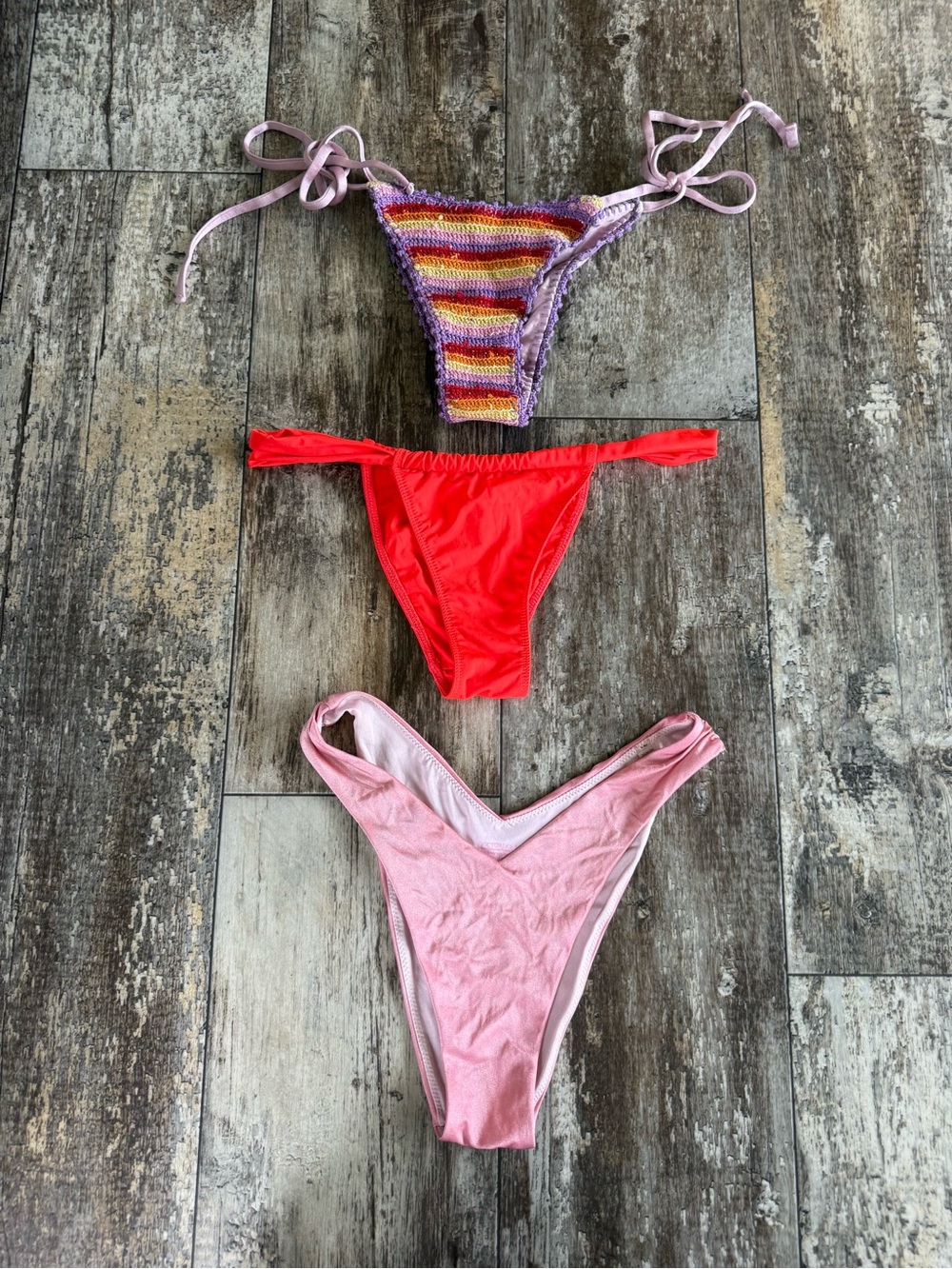 2 for $20; Trio tiny Bikini bottoms red Zara, Victoria’s Secret purple crochet